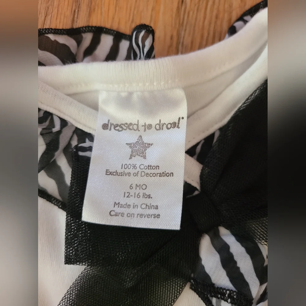 dressed to drool 6 months black and white romper with bows